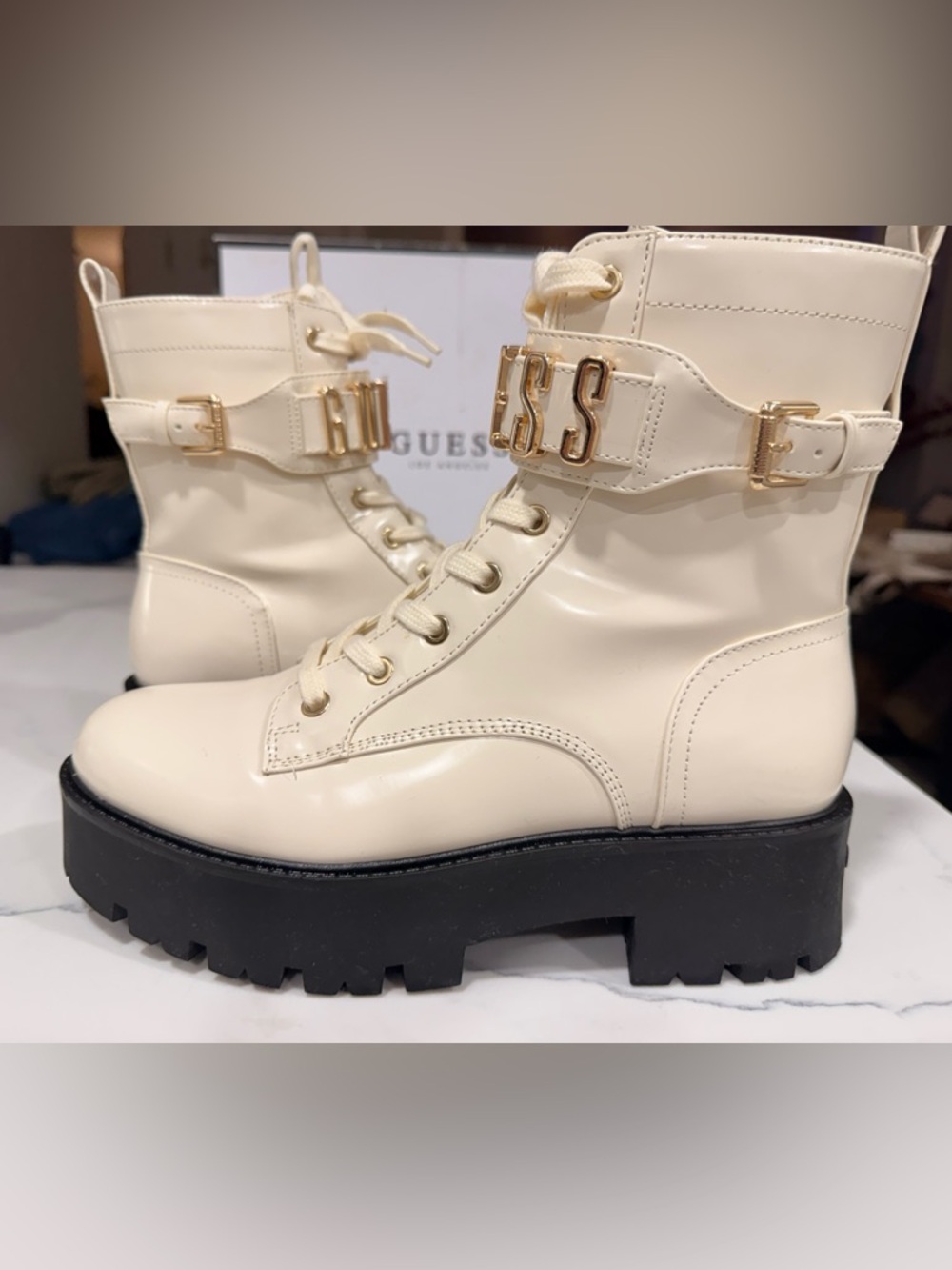 GUESS Cream Combat Boot with Black Lug Sole and Gold Logo Cuff - Picture 9 of 10